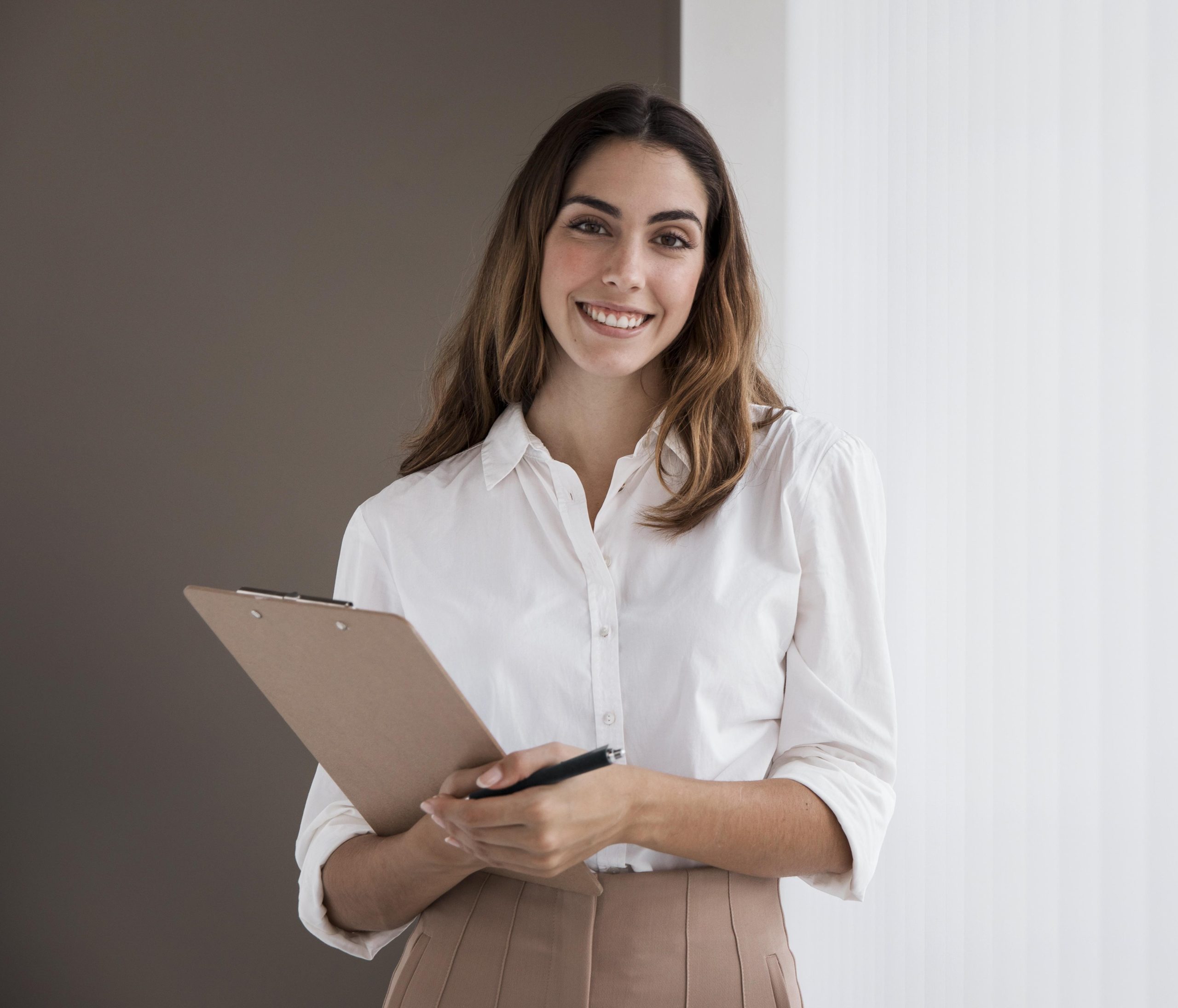 front view elegant businesswoman holding clipboard with copy space 1
